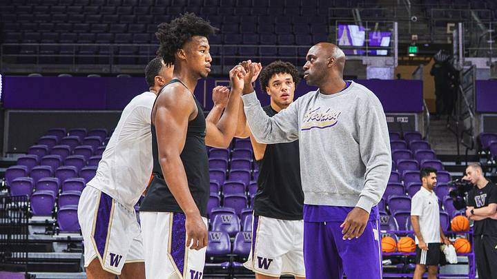 Wesley Yates III bumps fists with UW assistant coach Quincy Pondexter. Wesley Yates III bumps fists with UW assistant coach Quincy Pondexter.