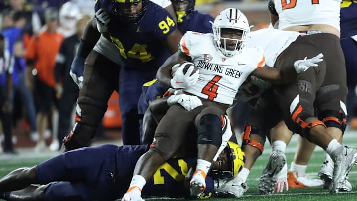 Michigan defensive back DJ Waller Jr. tackles Bowling Green running back Terion Stewart on Saturday, Sept. 16, 2023.