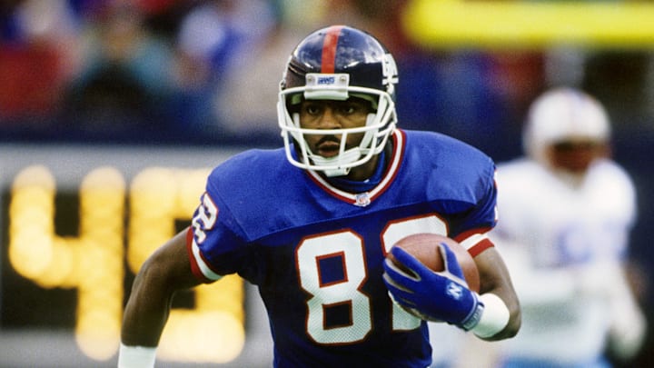 Dec 21, 1991; E. Rutherford, NJ, USA; New York Giants receiver Mark Ingram Sr. (82) carries the ball against the Houston Oilers at Giants Stadium. 