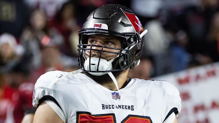 Dec 25, 2022; Glendale, Arizona, USA; Tampa Bay Buccaneers offensive tackle Robert Hainsey (70) against the Arizona Cardinals at State Farm Stadium. Mandatory Credit: Mark J. Rebilas-Imagn Images