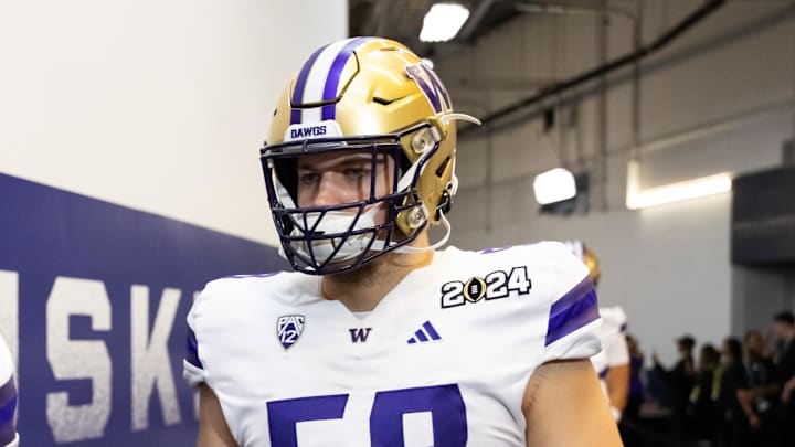 Jan 8, 2024; Houston, TX, USA; Washington Huskies offensive lineman Zachary Henning (58) against the Michigan Wolverines during the 2024 College Football Playoff national championship game at NRG Stadium. Mandatory Credit: Mark J. Rebilas-Imagn Images