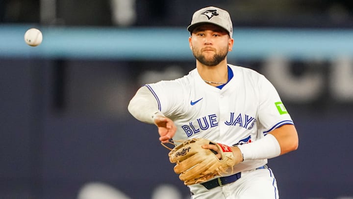 May 17, 2025; Toronto, Ontario, CAN; Toronto Blue Jays shortstop Bo Bichette (11) throws to first base against the Detroit Tigers at Rogers Centre.