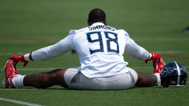 Tennessee Titans defensive tackle Jeffrey Simmons (98) stretches during mandatory Titans Minicamp at Ascension Saint Thomas Sports Park in Nashville, Tenn., Tuesday, June 10, 2025.