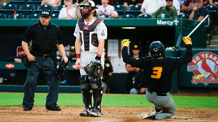 Mizzou's Danny Corona slides safely into home as the Tigers took on the Missouri State Beats at Hammons Field on Tuesday, April 16, 2024