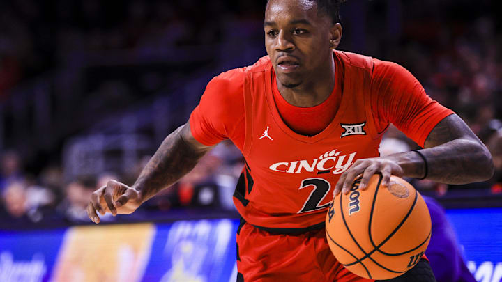 Mar 5, 2025; Cincinnati, Ohio, USA; Cincinnati Bearcats guard Jizzle James (2) dribbles against the Kansas State Wildcats in the first half at Fifth Third Arena. Mandatory Credit: Katie Stratman-Imagn Images