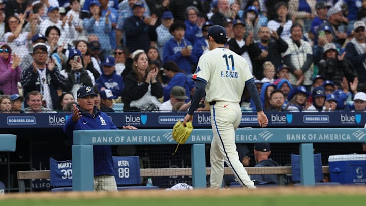 Fans acknowledge Los Angeles Dodgers starting pitcher Roki Sasaki (11) after a pitching change against the Chicago Cubs during the sixth inning at Dodger Stadium on April 11. Fans acknowledge Los Angeles Dodgers starting pitcher Roki Sasaki (11) after a pitching change against the Chicago Cubs during the sixth inning at Dodger Stadium on April 11.