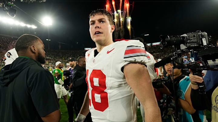 Ohio State Buckeyes quarterback Will Howard (18) celebrates following the 41-21 win over the Oregon Ducks in the College Football Playoff quarterfinal at the Rose Bowl. Ohio State Buckeyes quarterback Will Howard (18) celebrates following the 41-21 win over the Oregon Ducks in the College Football Playoff quarterfinal at the Rose Bowl.