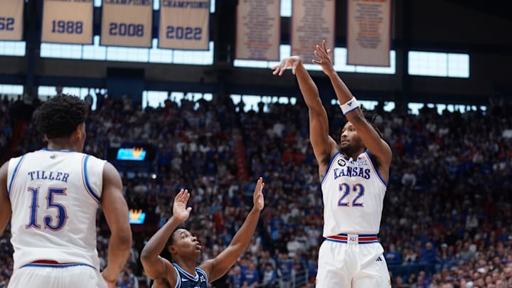 Kansas Jayhawks guard Darryn Peterson (22) fires a three point shot against BYU Cougars during the game inside Allen Fieldhouse on Jan. 31, 2026. Kansas Jayhawks guard Darryn Peterson (22) fires a three point shot against BYU Cougars during the game inside Allen Fieldhouse on Jan. 31, 2026.