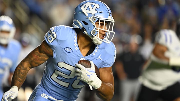 Nov 11, 2023; Chapel Hill, North Carolina, USA; North Carolina Tar Heels running back Omarion Hampton (28) with the ball in the first quarter at Kenan Memorial Stadium. Mandatory Credit: Bob Donnan-Imagn Images Nov 11, 2023; Chapel Hill, North Carolina, USA; North Carolina Tar Heels running back Omarion Hampton (28) with the ball in the first quarter at Kenan Memorial Stadium. Mandatory Credit: Bob Donnan-Imagn Images