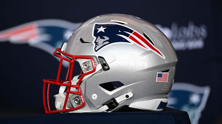Jan 17, 2024; Foxborough, MA, USA; A New England Patriots helmet sits on a table prior to a press conference at Gillette Stadium. Mandatory Credit: Eric Canha-Imagn Images