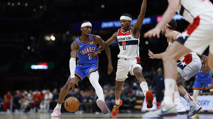 Jan 8, 2024; Washington, District of Columbia, USA; Oklahoma City Thunder guard Shai Gilgeous-Alexander (2) drives to the basket as Washington Wizards guard Bilal Coulibaly (0) defends in the second quarter at Capital One Arena. Mandatory Credit: Geoff Burke-Imagn Images Jan 8, 2024; Washington, District of Columbia, USA; Oklahoma City Thunder guard Shai Gilgeous-Alexander (2) drives to the basket as Washington Wizards guard Bilal Coulibaly (0) defends in the second quarter at Capital One Arena. Mandatory Credit: Geoff Burke-Imagn Images