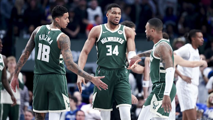 Mar 1, 2025; Dallas, Texas, USA: Milwaukee Bucks forward Giannis Antetokounmpo (34) celebrates with Milwaukee Bucks guard Damian Lillard (0) and Milwaukee Bucks forward Kyle Kuzma (18) against the Dallas Mavericks during the first half at American Airlines Center. Mandatory Credit: Kevin Jairaj-Imagn Images Mar 1, 2025; Dallas, Texas, USA: Milwaukee Bucks forward Giannis Antetokounmpo (34) celebrates with Milwaukee Bucks guard Damian Lillard (0) and Milwaukee Bucks forward Kyle Kuzma (18) against the Dallas Mavericks during the first half at American Airlines Center. Mandatory Credit: Kevin Jairaj-Imagn Images