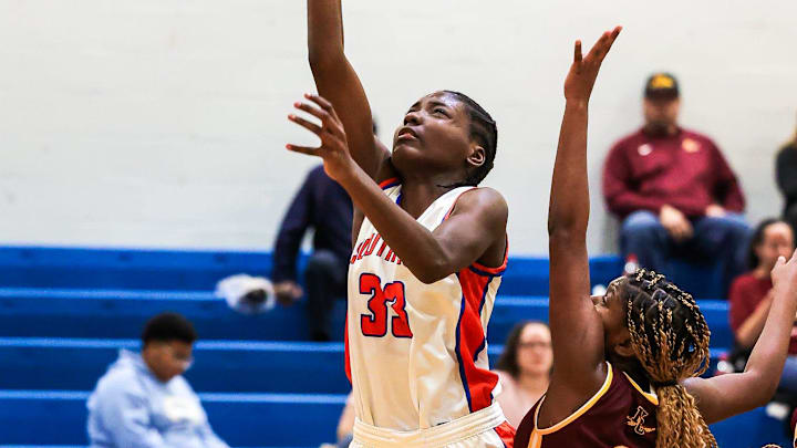 Southwood forward Kamara Effit (33) shooting a lay-up during a basketball game versus Natchitoches Central in Shreveport, La.