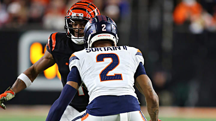 CINCINNATI, OH - DECEMBER 28 - Denver Broncos cornerback Pat Surtain II (2) covers Cincinnati Bengals wide receiver Ja'Marr Chase (1) in a game between the Denver Broncos and the Cincinnati Bengals at Paycor Stadium on Saturday, December 28, 2024. 