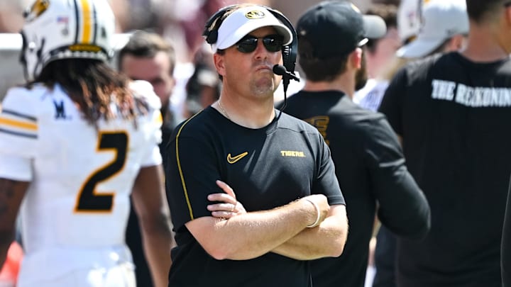 Oct 5, 2024; College Station, Texas, USA; Missouri Tigers head coach Eli Drinkwitz looks on In the third quarter against the Texas A&M Aggies at Kyle Field. Mandatory Credit: Maria Lysaker-Imagn Images. Oct 5, 2024; College Station, Texas, USA; Missouri Tigers head coach Eli Drinkwitz looks on In the third quarter against the Texas A&M Aggies at Kyle Field. Mandatory Credit: Maria Lysaker-Imagn Images.