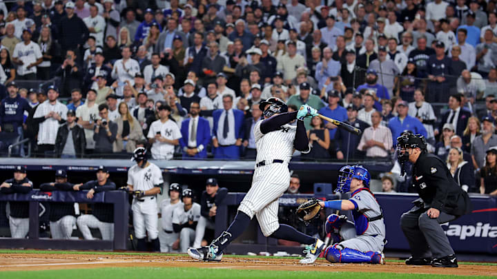 Oct 30, 2024; New York, New York, USA; New York Yankees outfielder Aaron Judge (99) hits a three-run home run during the first inning against the Los Angeles Dodgers in Game 5 of the 2024 MLB World Series at Yankee Stadium. Oct 30, 2024; New York, New York, USA; New York Yankees outfielder Aaron Judge (99) hits a three-run home run during the first inning against the Los Angeles Dodgers in Game 5 of the 2024 MLB World Series at Yankee Stadium.