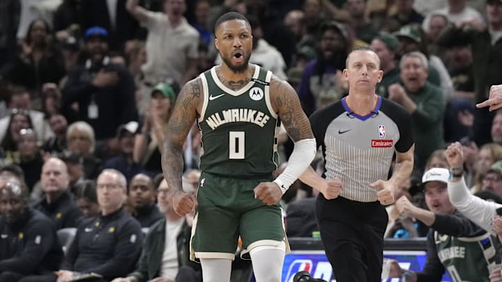 Apr 25, 2025; Milwaukee, Wisconsin, USA; Milwaukee Bucks guard Damian Lillard (0) reacts after making a basket against the Indiana Pacers in the second half during game three of first round for the 2024 NBA Playoffs at Fiserv Forum. Mandatory Credit: Michael McLoone-Imagn Images