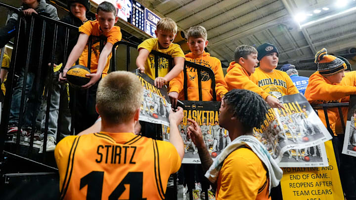 Iowa Hawkeyes guards Bennett Stirtz (14) and Tavion Banks (6) Iowa Hawkeyes guards Bennett Stirtz (14) and Tavion Banks (6)