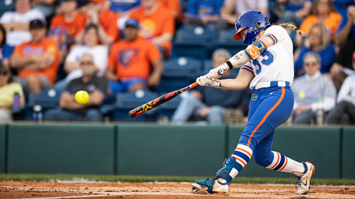Florida Gators outfielder Korbe Otis (33) hits the ball against the LSU Tigers during the game at Katie Seashole Pressly Stadium at the University of Florida in Gainesville, FL on Monday, April 8, 2024. [Matt Pendleton/Gainesville Sun]