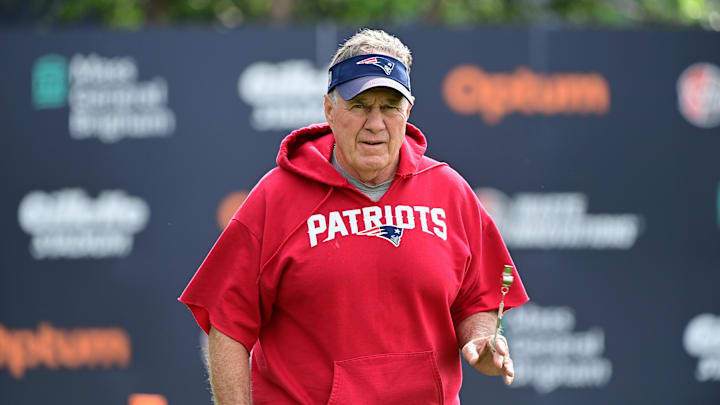Jul 27, 2023; Foxborough, MA, USA; New England Patriots head coach Bill Belichick heads to the podium for a morning press conference before training camp at Gillette Stadium. Mandatory Credit: Eric Canha-Imagn Images