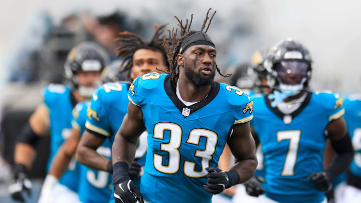 Jacksonville Jaguars linebacker Devin Lloyd (33) runs on the field before an NFL football matchup Sunday, Dec. 15, 2024 at EverBank Stadium in Jacksonville, Fla. [Corey Perrine/Florida Times-Union]