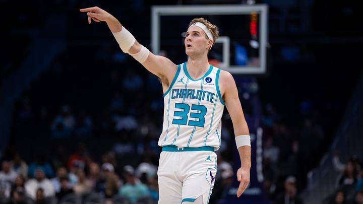 Charlotte Hornets guard Liam McNeeley (33) watches his shot during the first half Charlotte Hornets guard Liam McNeeley (33) watches his shot during the first half