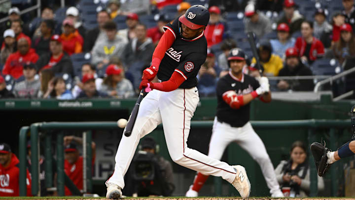 Washington Nationals outfielder James Wood hits a two-run double against the Atlanta Braves during the second inning at Nationals Park.