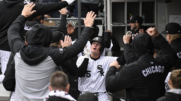 Chicago White Sox first base Andrew Vaughn (25) celebrates in the dugout after hitting a three-run home run against the Minnesota Twins at Rate Field. 