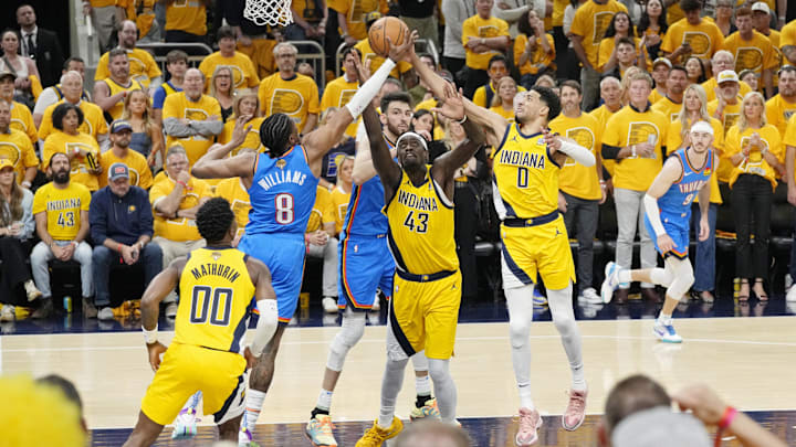Jun 13, 2025; Indianapolis, Indiana, USA: Oklahoma City Thunder forward Jalen Williams (8) reaches for the ball against Indiana Pacers forward Pascal Siakam (43) and guard Tyrese Haliburton (0) during the first half during game four of the 2025 NBA Finals at Gainbridge Fieldhouse. Mandatory Credit: Kyle Terada-Imagn Images Jun 13, 2025; Indianapolis, Indiana, USA: Oklahoma City Thunder forward Jalen Williams (8) reaches for the ball against Indiana Pacers forward Pascal Siakam (43) and guard Tyrese Haliburton (0) during the first half during game four of the 2025 NBA Finals at Gainbridge Fieldhouse. Mandatory Credit: Kyle Terada-Imagn Images