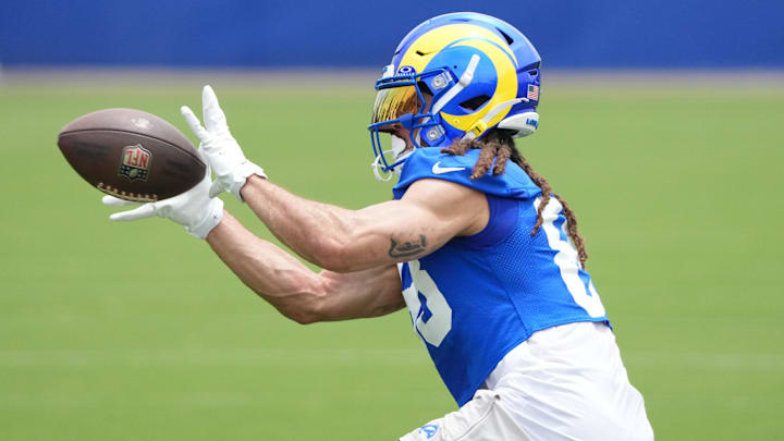 May 28, 2025; Woodland Hills, CA, USA; Los Angeles Rams wide receiver Jordan Whittington (88) catches a pass during organized team activities at Rams Practice Facility. Mandatory Credit: Kirby Lee-Imagn Images