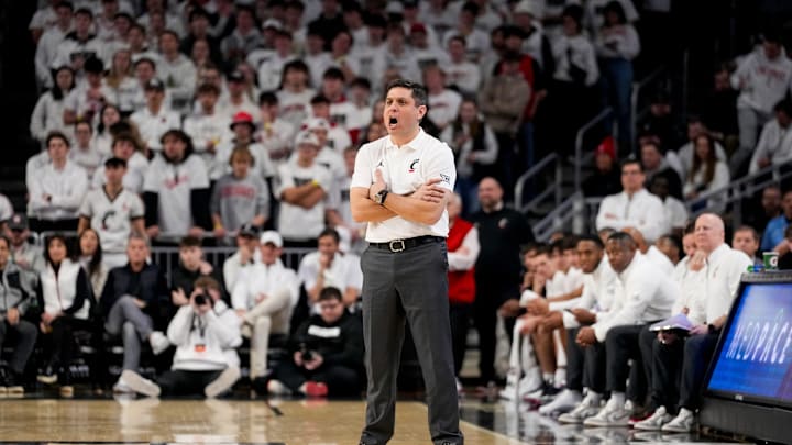 Cincinnati Bearcats head coach Wes Miller shouts to his defense in the first half of the NCAA Big 12 basketball game between the Cincinnati Bearcats and the Iowa State Cyclones at Fifth Third Stadium in Cincinnati on Saturday, Jan. 17, 2026.