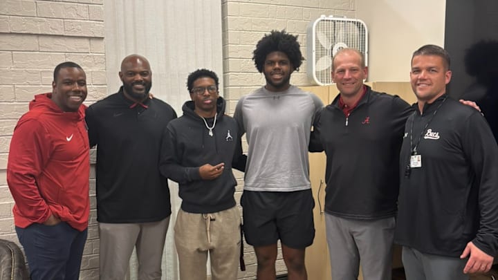 2026 DL Tyson Bacon alongside head coach Kalen DeBoer, co-offensive coordinator JaMarcus Shephard and defensive line coach Freddie Roach. 