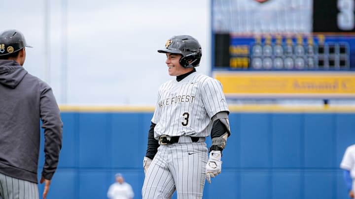 Wake Forest's JD Stein gets on first base against the Pittsburgh Panthers. Wake Forest's JD Stein gets on first base against the Pittsburgh Panthers.