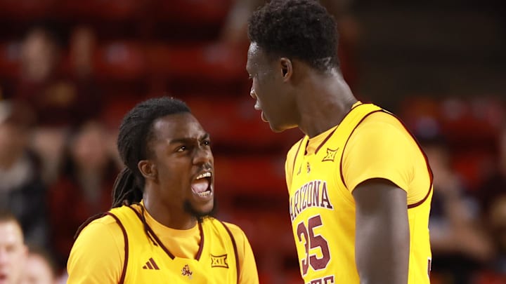 Jan 10, 2026; Tempe, Arizona, USA; Arizona State Sun Devils guard Anthony Johnson (2) celebrates with center Massamba Diop (35) against the Kansas State Wildcats in the second half at Desert Financial Arena. Mandatory Credit: Mark J. Rebilas-Imagn Images