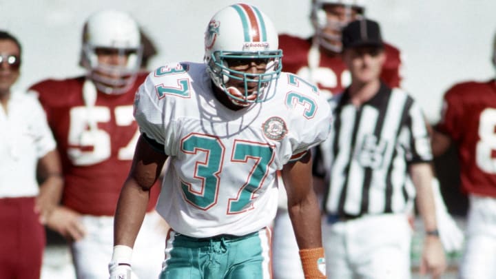 Miami Dolphins defensive back J.B. Brown in action against the Arizona Cardinals at Joe Robbie Stadium during the 1990 season. Miami Dolphins defensive back J.B. Brown in action against the Arizona Cardinals at Joe Robbie Stadium during the 1990 season.
