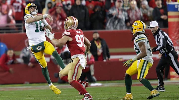 Green Bay Packers quarterback Jordan Love (10) throws an interception that is caught by San