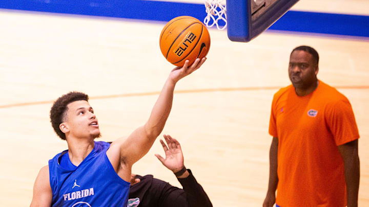 Florida Gators guard Walter Clayton Jr. (1) makes a layup as the Florida Gators men’s basketball team held a practice on John W. Frost II Practice Court in Gainesville, FL on Tuesday, September 24, 2024. [Doug Engle/Gainesville Sun]