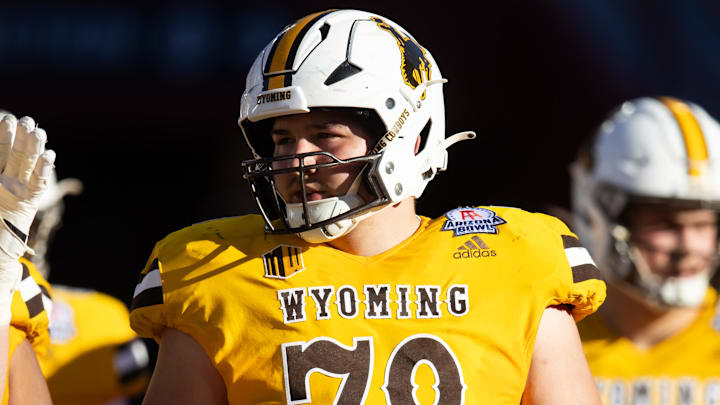 Dec 30, 2023; Tucson, AZ, USA; Wyoming Cowboys guard Wes King (78) against the Toledo Rockets during the Arizona Bowl at Arizona Stadium. Mandatory Credit: Mark J. Rebilas-USA TODAY Sports