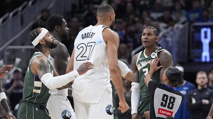 Apr 8, 2025; Milwaukee, Wisconsin, USA: Milwaukee Bucks guard Kevin Porter Jr. (3) and Minnesota Timberwolves center Rudy Gobert (27) in an altercation during the second half at Fiserv Forum. Mandatory Credit: Michael McLoone-Imagn Images