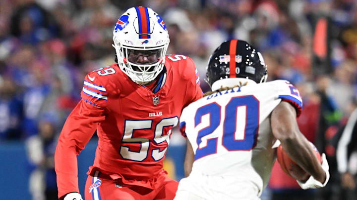Oct 15, 2023; Orchard Park, New York, USA;Buffalo Bills defensive end Kingsley Jonathan (59) against New York Giants running back Eric Gray (20)