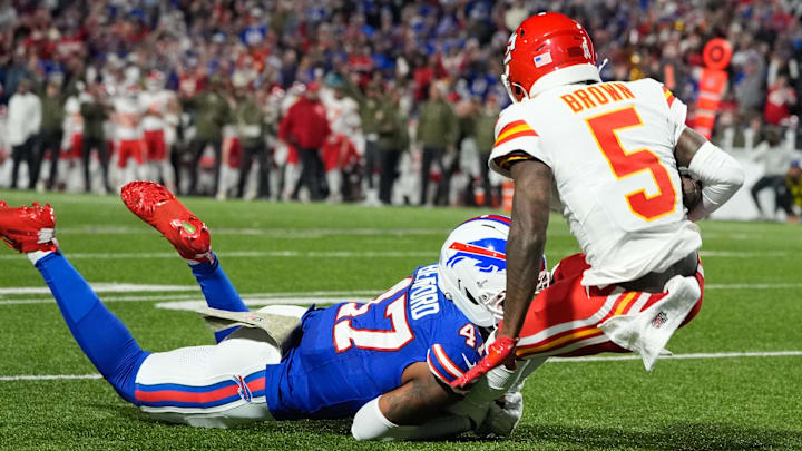Nov 2, 2025; Orchard Park, New York, USA; Buffalo Bills cornerback Christian Benford (47) brings down Kansas City Chiefs wide receiver Hollywood Brown (5) in the second quarter at Highmark Stadium.