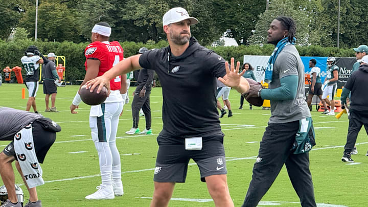 Eagles head coach Nick Sirianni fires passes at receivers during individual drills at training camp on Day 16.