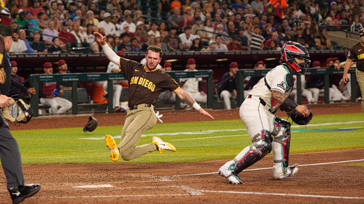 Aug 5, 2025; Phoenix, Arizona, USA; San Diego Padres outfielder Jackson Merrill (3) scores a run in the seventh inning against the Arizona Diamondbacks at Chase Field. Mandatory Credit: Allan Henry-Imagn Images