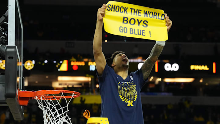 Apr 6, 2026; Indianapolis, IN, USA; Michigan Wolverines forward Yaxel Lendeborg (23) celebrates after defeating the Connecticut Huskies in the national championship of the Final Four of the men's 2026 NCAA Tournament at Lucas Oil Stadium. Mandatory Credit: Robert Deutsch-Imagn Images