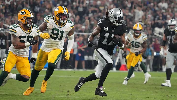 Oct 9, 2023; Paradise, Nevada, USA; Las Vegas Raiders wide receiver Davante Adams (17) is pursued by Green Bay Packers linebacker Preston Smith (91) and linebacker De'Vondre Campbell (59) in the second half at Allegiant Stadium. Mandatory Credit: Kirby Lee-USA TODAY Sports Oct 9, 2023; Paradise, Nevada, USA; Las Vegas Raiders wide receiver Davante Adams (17) is pursued by Green Bay Packers linebacker Preston Smith (91) and linebacker De'Vondre Campbell (59) in the second half at Allegiant Stadium. Mandatory Credit: Kirby Lee-USA TODAY Sports