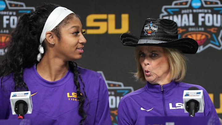 Mar 30, 2023; Dallas, TX, USA; LSU Tigers forward Angel Reese (left) and coach Kim Mulkey react during the press conference at the American Airlines Center. Mandatory Credit: Kirby Lee-Imagn Images Mar 30, 2023; Dallas, TX, USA; LSU Tigers forward Angel Reese (left) and coach Kim Mulkey react during the press conference at the American Airlines Center. Mandatory Credit: Kirby Lee-Imagn Images