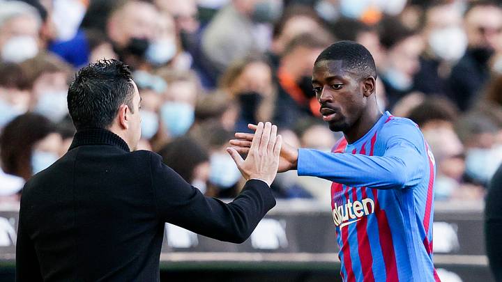 Xavi y Dembélé en un partido de liga Xavi y Dembélé en un partido de liga
