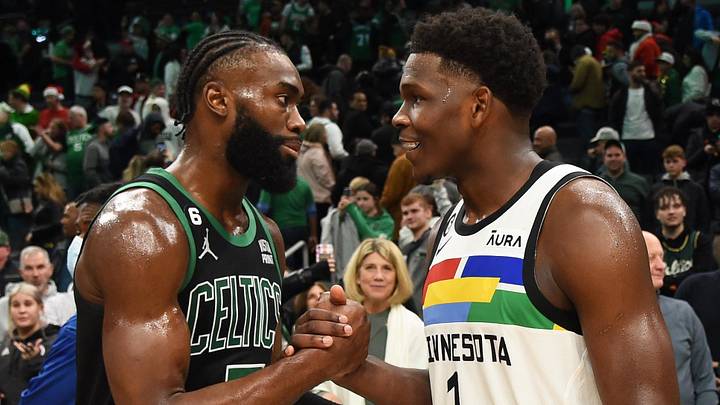 Dec 23, 2022; Boston, Massachusetts, USA;  Boston Celtics guard Jaylen Brown (7) and Minnesota Timberwolves guard Anthony Edwards (1) after the Celtics defeated the Timberwolves at TD Garden.