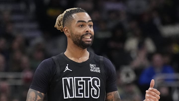 Jan 2, 2025; Milwaukee, Wisconsin, USA; Brooklyn Nets guard D’Angelo Russell (1) brings the ball up the court against the Milwaukee Bucks in the second half at Fiserv Forum. Mandatory Credit: Michael McLoone-Imagn Images Jan 2, 2025; Milwaukee, Wisconsin, USA; Brooklyn Nets guard D’Angelo Russell (1) brings the ball up the court against the Milwaukee Bucks in the second half at Fiserv Forum. Mandatory Credit: Michael McLoone-Imagn Images