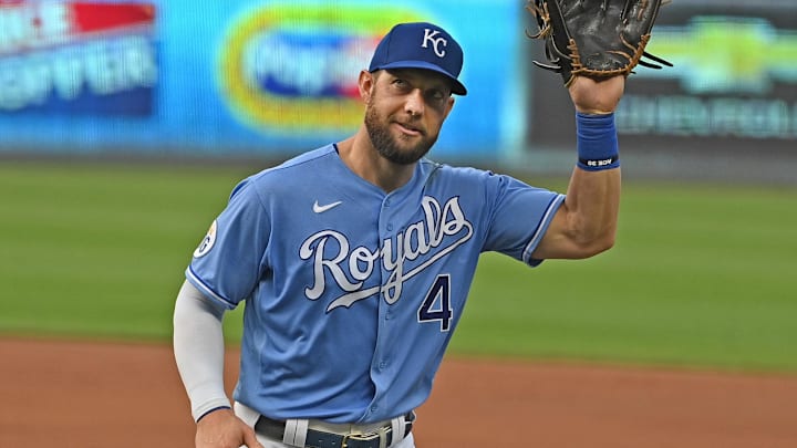 Sep 26, 2020; Kansas City, Missouri, USA;  Kansas City Royals left fielder Alex Gordon (4) waves to family and friends in the press box during the first inning against the Detroit Tigers at Kauffman Stadium. Mandatory Credit: Peter Aiken-Imagn Images